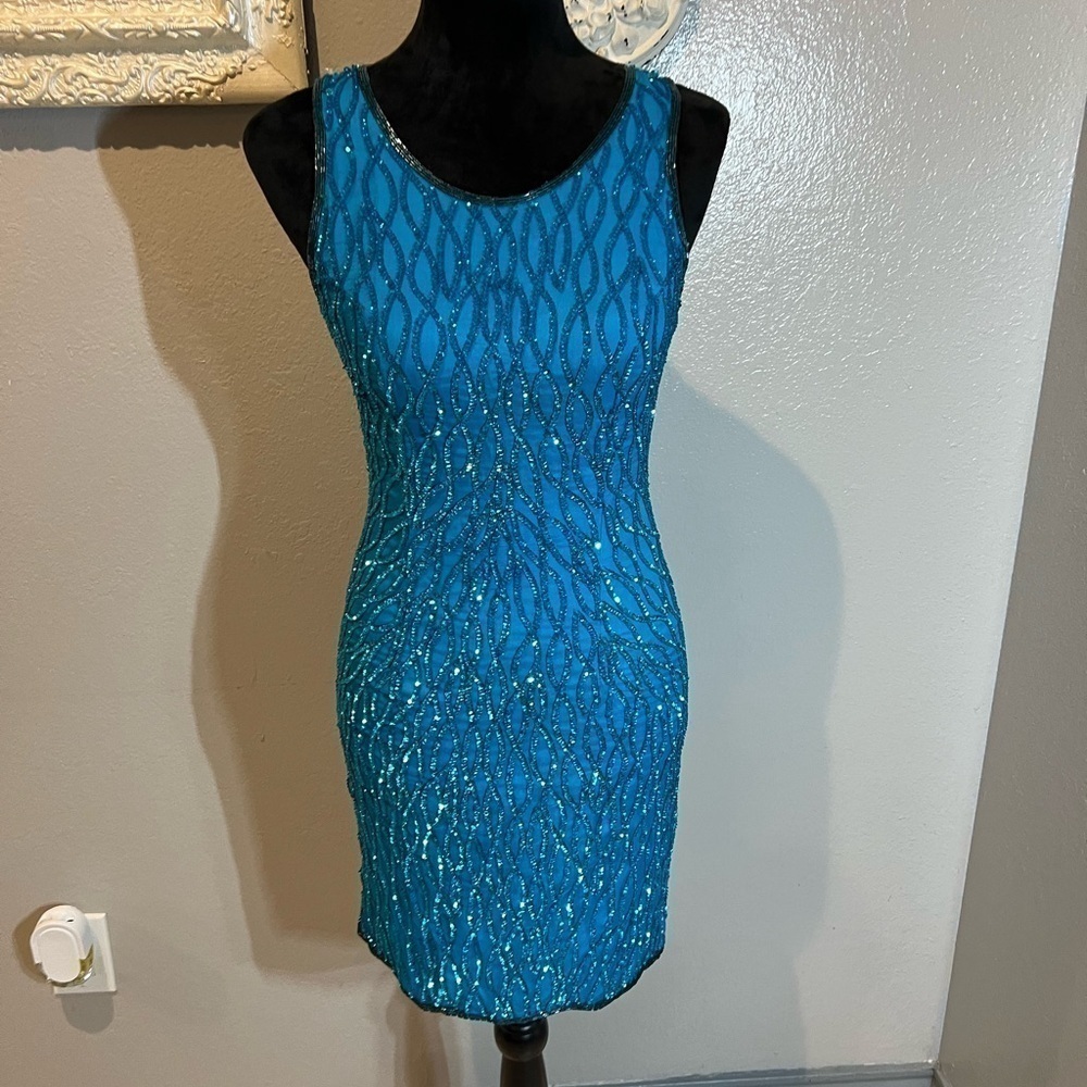 Lawrence kazarr striking sequined dress.